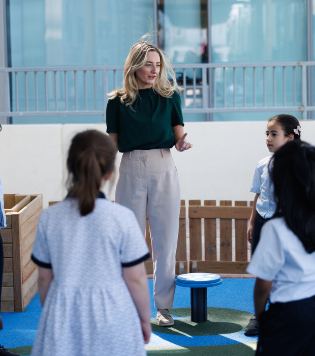 WSQ Primary Teacher with students